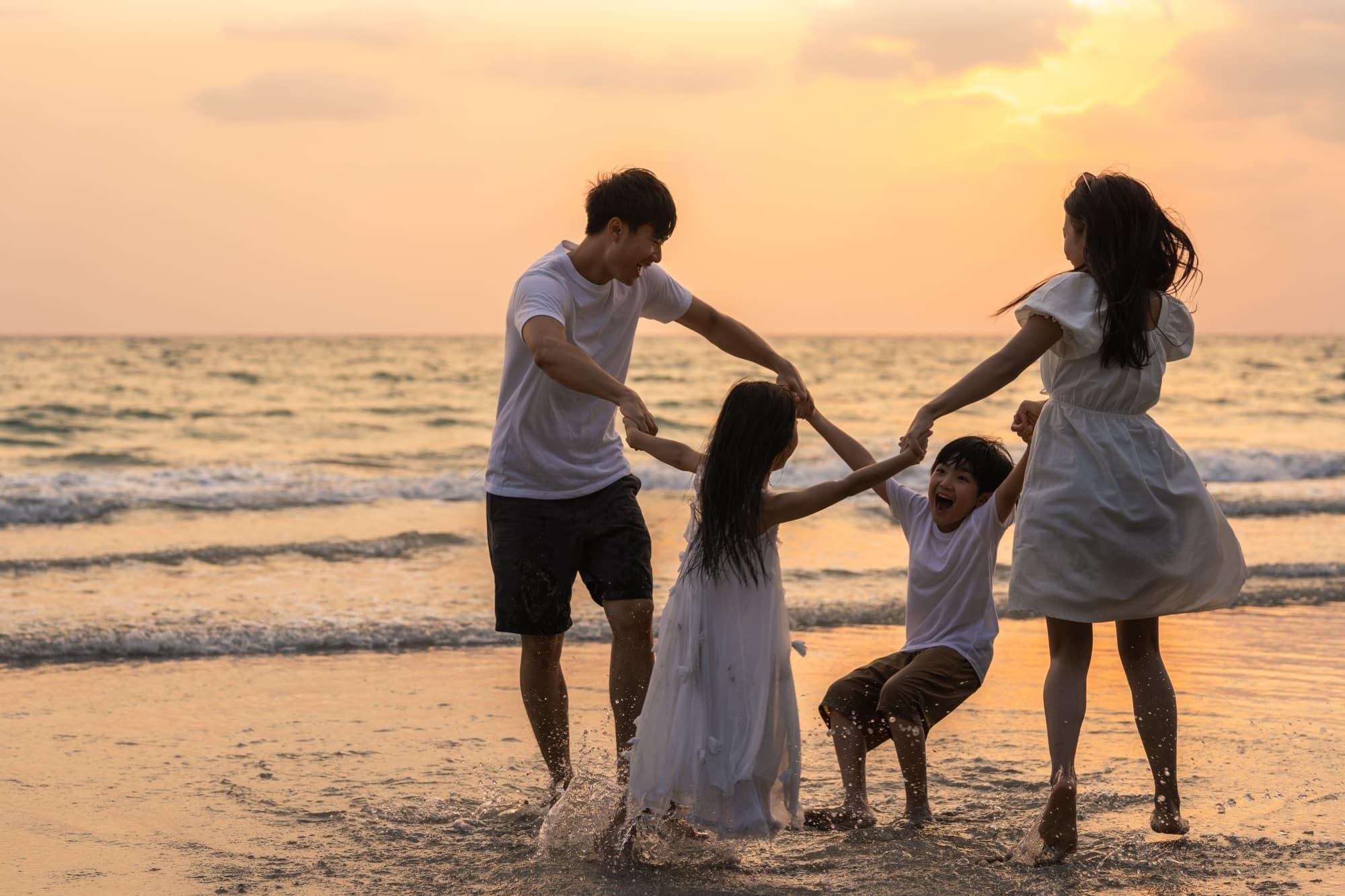 Family having fun at the Angsana Laguna Phuket Beach