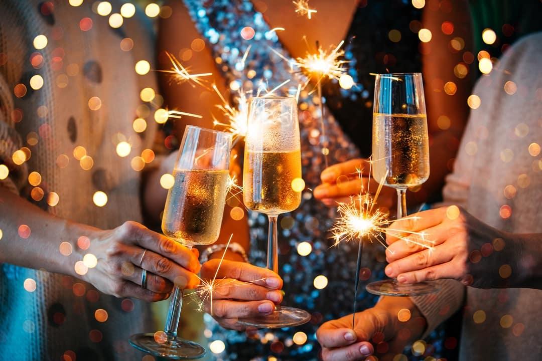 New year celebration, champagne glasses, people celebrating together, countdown